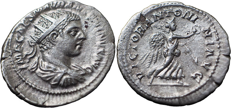 Silver antoninianus of Elagabalus with Victory running right holding wreath and palm